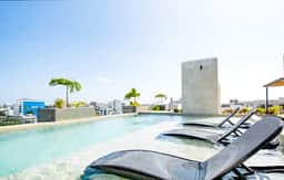Mamitas Beach Getaway - Rooftop Pool and Kitchen - Image 2
